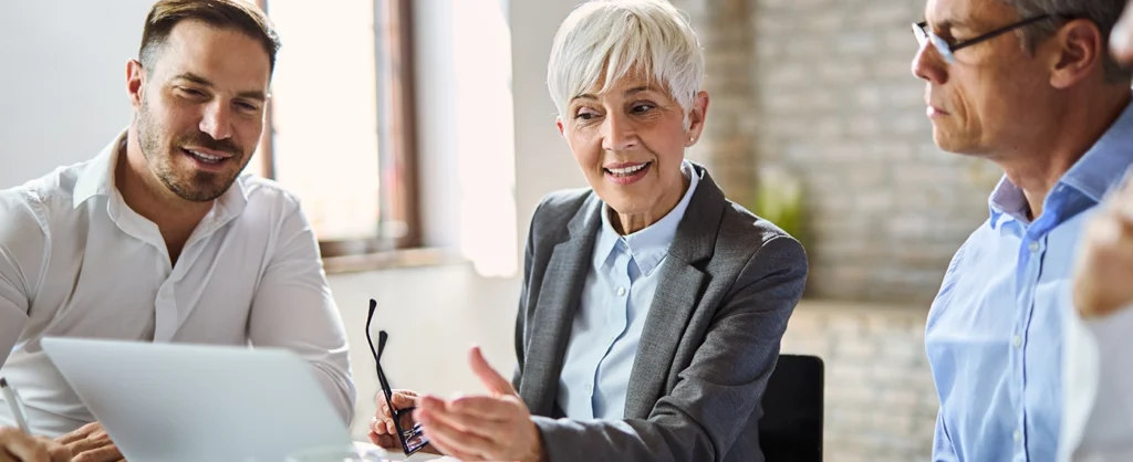 3 Workers Discussing 3PL Logistics Solutions at Best Ecommerce 3PL Company