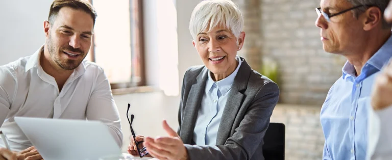 3 Workers Discussing 3PL Logistics Solutions at Best Ecommerce 3PL Company